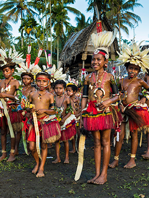 Children performing the Wosi Mwaya dance at the Milamala festival Kiriwina, 2018 (Hemis/Alamy)